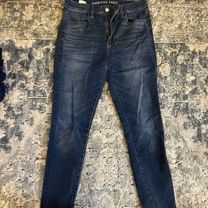 American Eagle dark-wash 360 stretch jegging.
